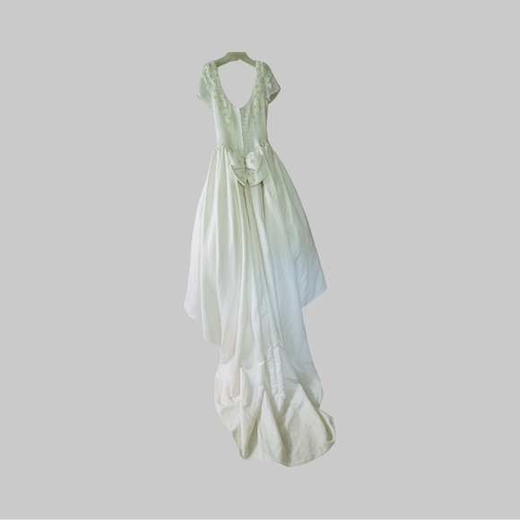 White Wedding Dress with Cap Sleeves and Flowing Skirt - Picture 6 of 12